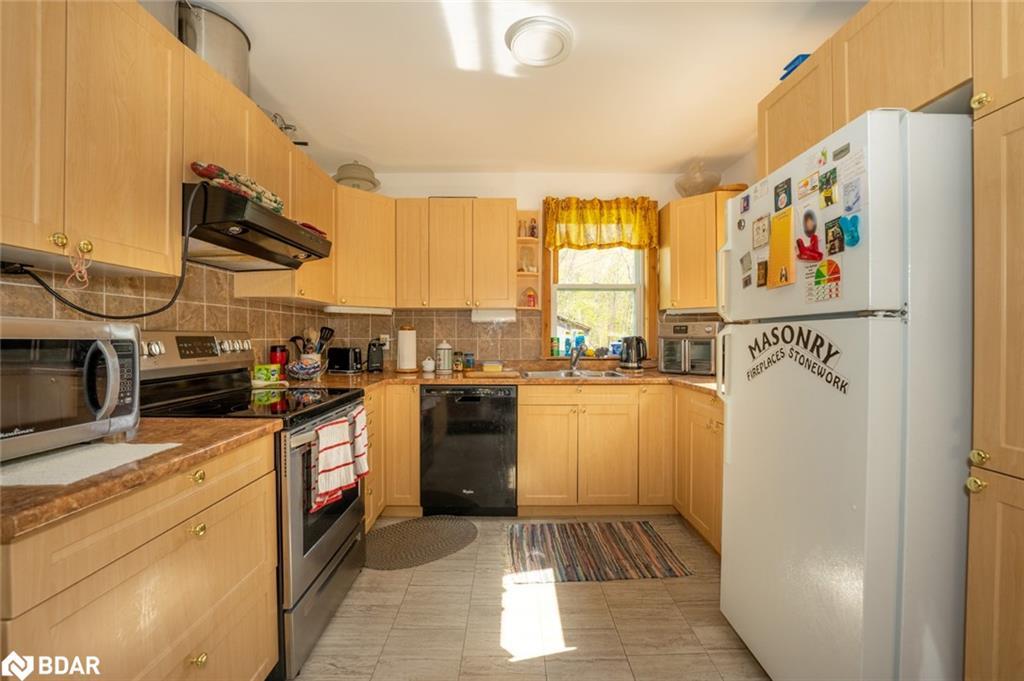 94 High Street, Mactier, ON - Indoor Photo Showing Kitchen With Double Sink