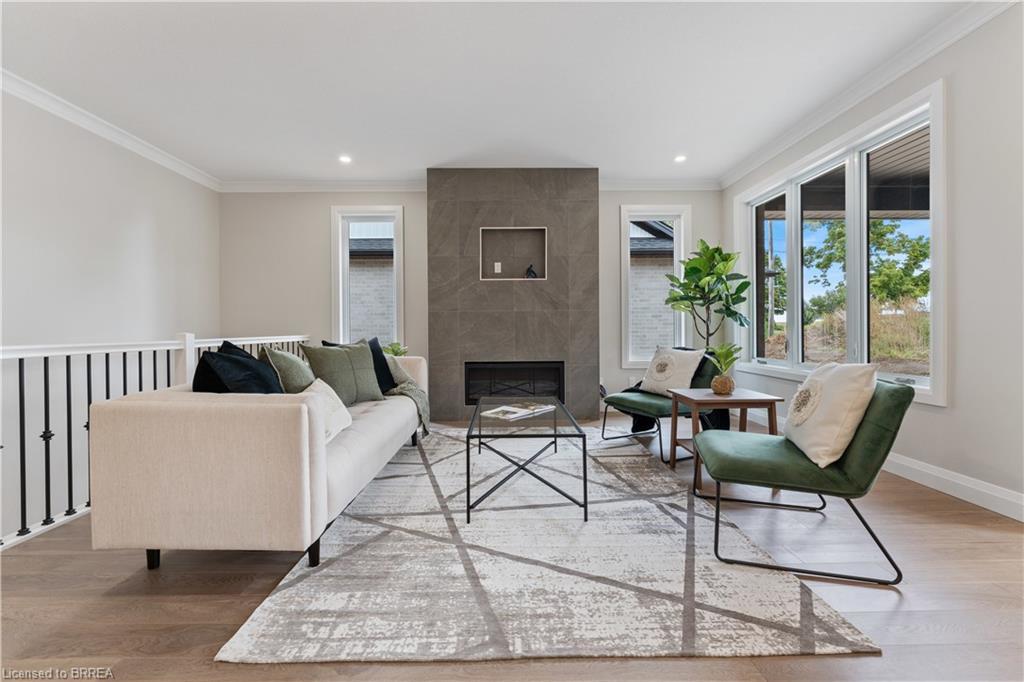 107 Judd Drive, Simcoe, ON - Indoor Photo Showing Living Room With Fireplace