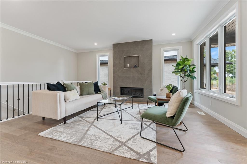 107 Judd Drive, Simcoe, ON - Indoor Photo Showing Living Room With Fireplace