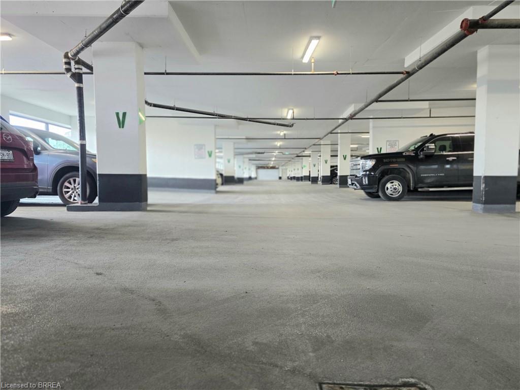 1203-105 Oneida Crescent, Richmond Hill, ON - Indoor Photo Showing Garage