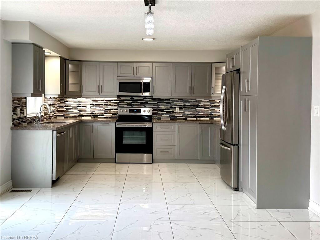 687 Spitfire Street, Woodstock, ON - Indoor Photo Showing Kitchen With Stainless Steel Kitchen With Upgraded Kitchen