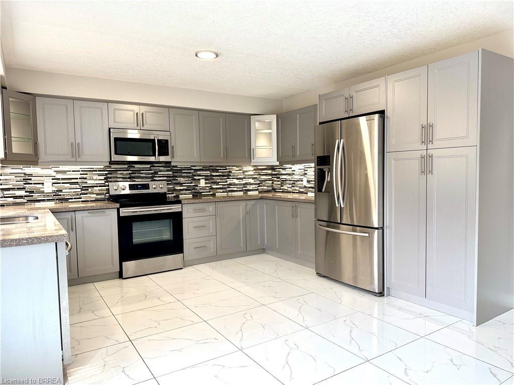 687 Spitfire Street, Woodstock, ON - Indoor Photo Showing Kitchen With Stainless Steel Kitchen With Upgraded Kitchen