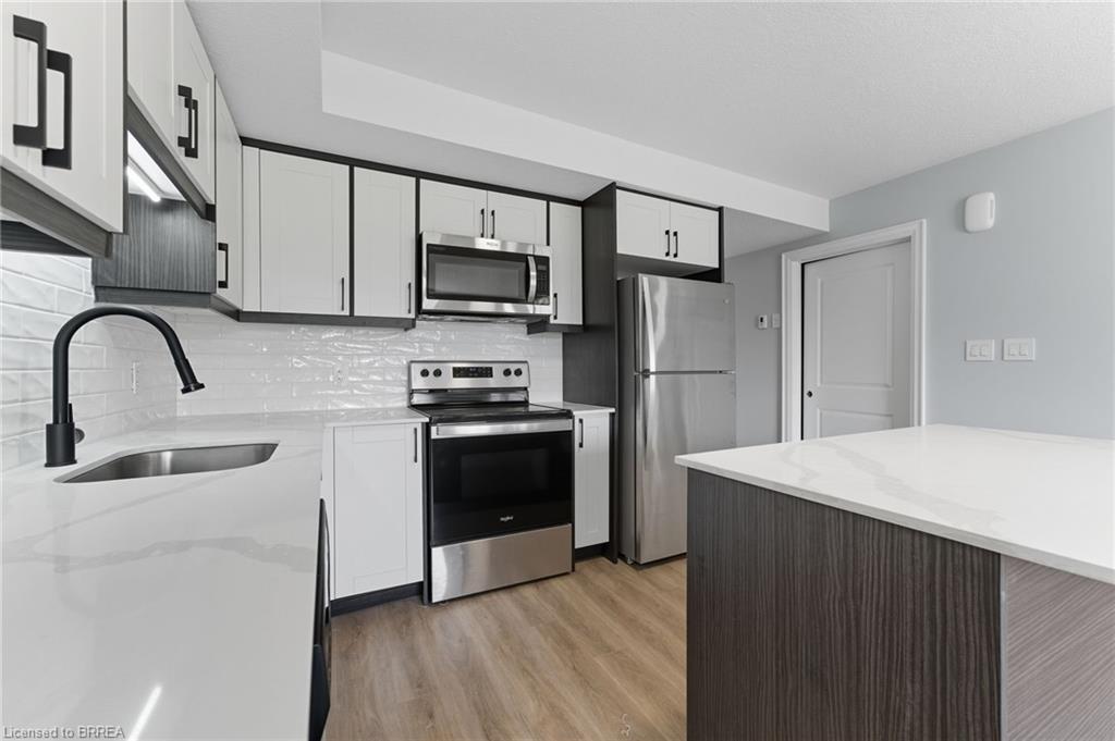 A17-160 Rochefort Street Street, Kitchener, ON - Indoor Photo Showing Kitchen With Stainless Steel Kitchen With Upgraded Kitchen