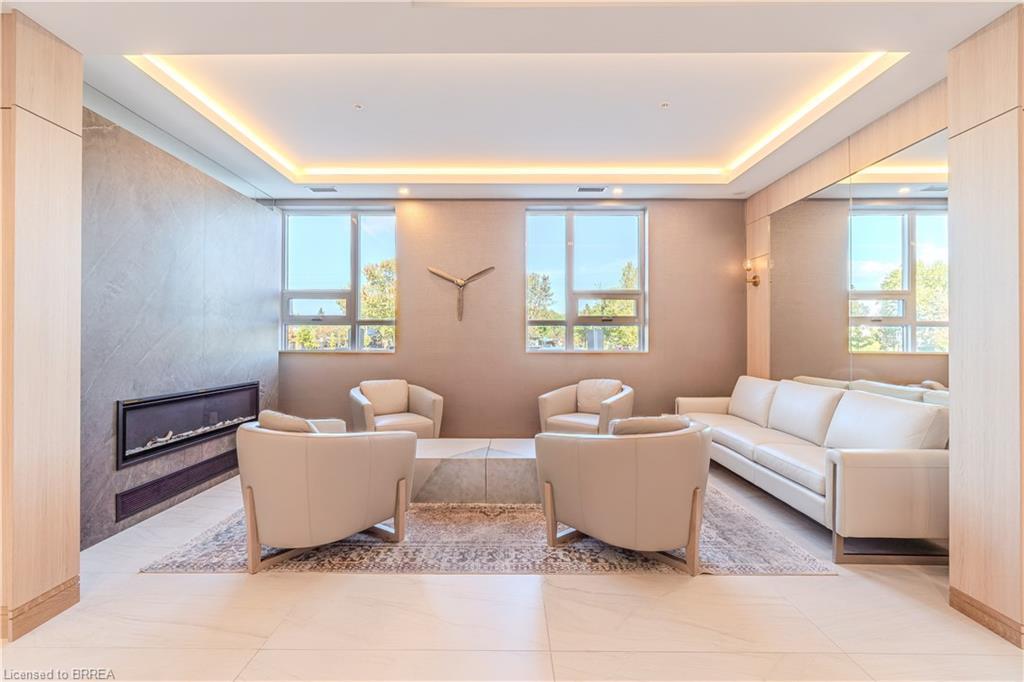 404-34 Norman Street, Brantford, ON - Indoor Photo Showing Living Room With Fireplace