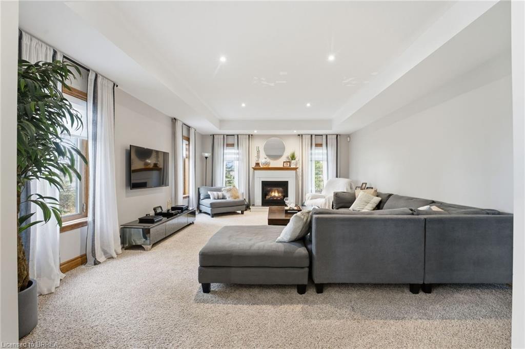 271 Windham 14 Road, Simcoe, ON - Indoor Photo Showing Living Room With Fireplace