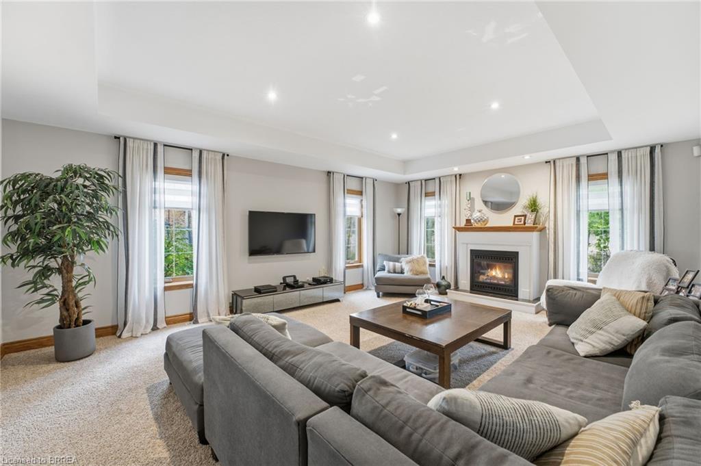 271 Windham 14 Road, Simcoe, ON - Indoor Photo Showing Living Room With Fireplace