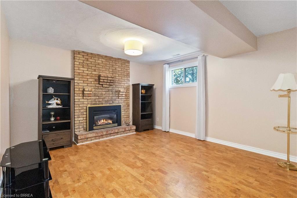 34 Sympatica Crescent, Brantford, ON - Indoor Photo Showing Living Room With Fireplace