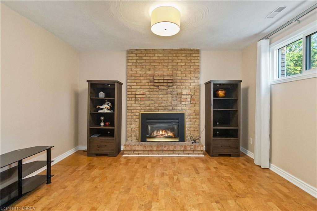 34 Sympatica Crescent, Brantford, ON - Indoor Photo Showing Living Room With Fireplace