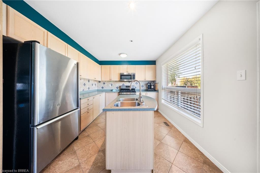 132 Blackburn Drive, Brantford, ON - Indoor Photo Showing Kitchen With Double Sink