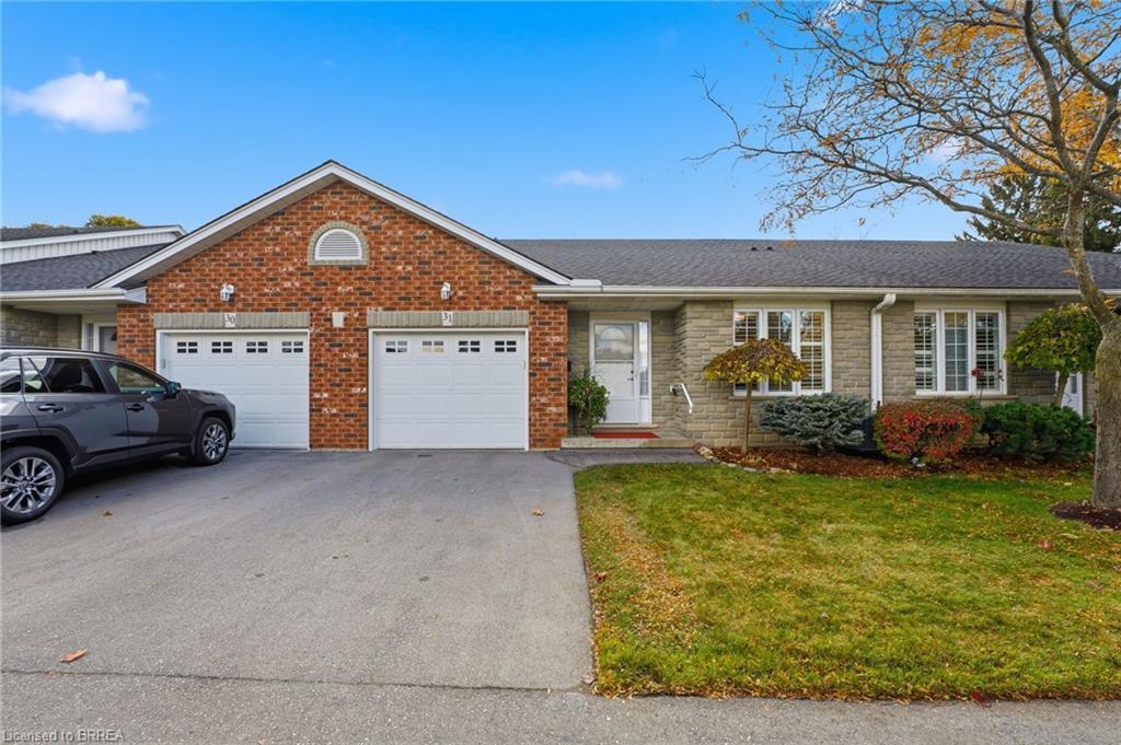 31-53 Heron'S Landing, Woodstock, ON - Outdoor With Facade