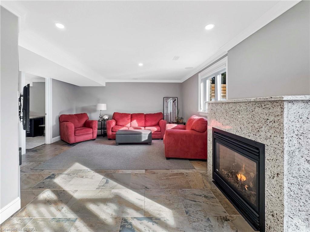 25 Bradbury Crescent, Paris, ON - Indoor Photo Showing Living Room With Fireplace