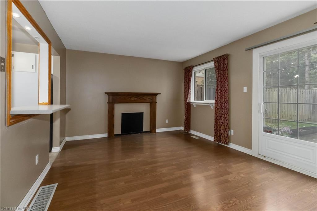 B-671 West Street, Brantford, ON - Indoor Photo Showing Other Room With Fireplace