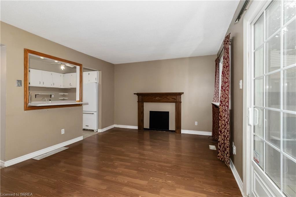 B-671 West Street, Brantford, ON - Indoor With Fireplace