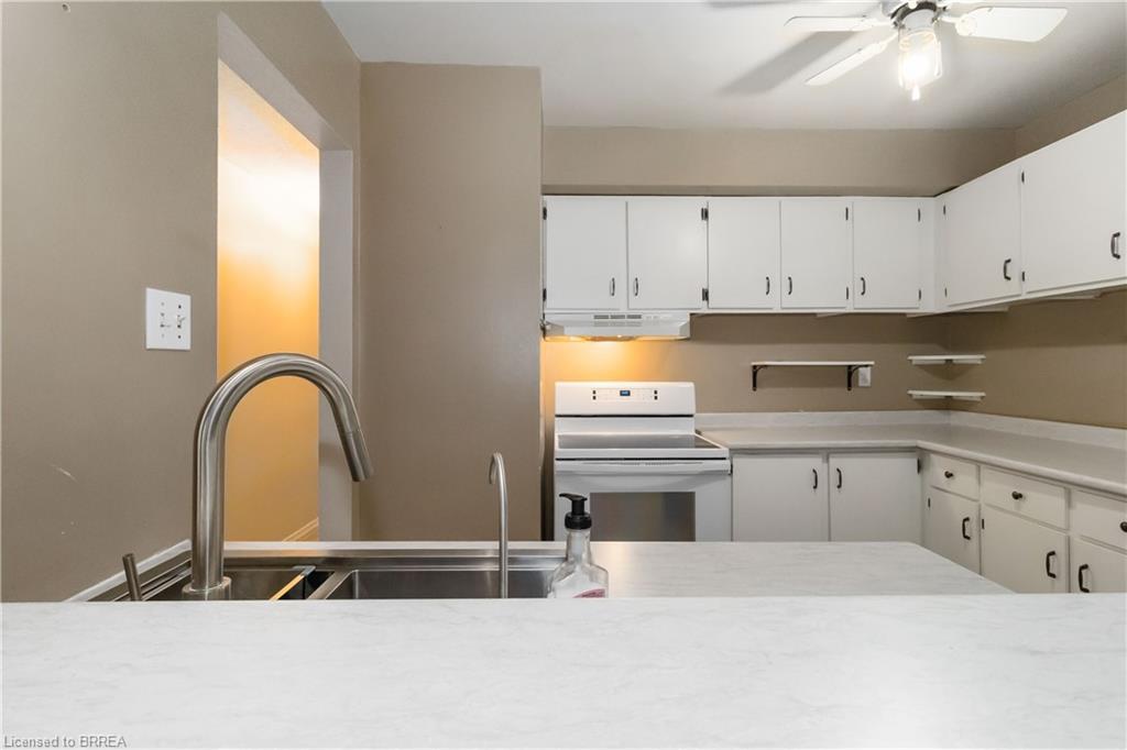 B-671 West Street, Brantford, ON - Indoor Photo Showing Kitchen With Double Sink
