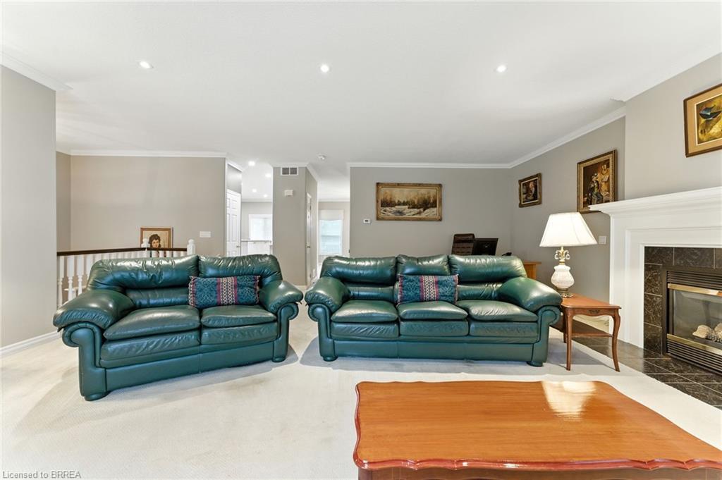 16-24 Hardy Road, Brantford, ON - Indoor Photo Showing Living Room With Fireplace
