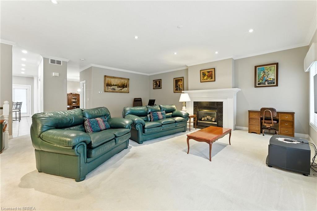 16-24 Hardy Road, Brantford, ON - Indoor Photo Showing Living Room With Fireplace