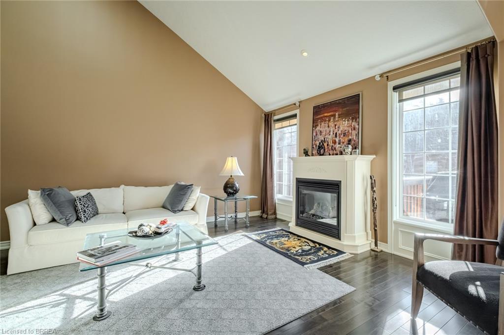 49-655 Park Road N, Brantford, ON - Indoor Photo Showing Living Room With Fireplace