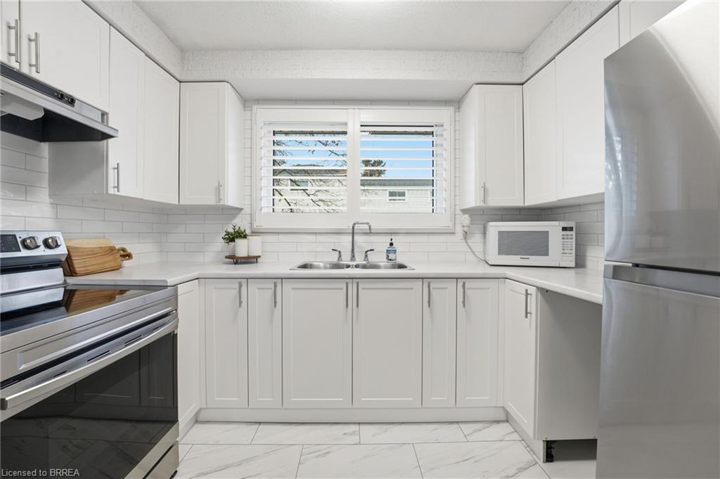 F-281 Stanley Street, Brantford, ON - Indoor Photo Showing Kitchen With Double Sink