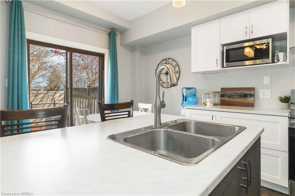 D2-12 Brantwood Park Road, Brantford, ON - Indoor Photo Showing Kitchen With Double Sink