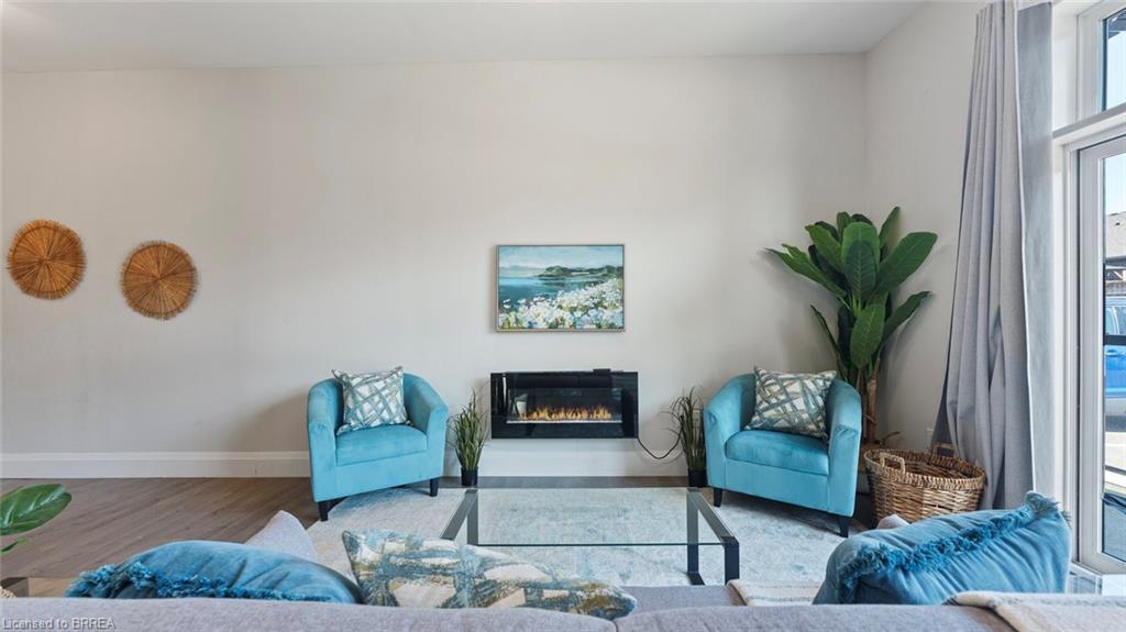 103A-85 Morrell Street, Brantford, ON - Indoor Photo Showing Living Room With Fireplace