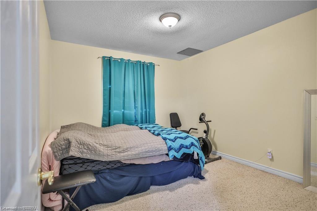 104-793 Colborne Street E, Brantford, ON - Indoor Photo Showing Bedroom