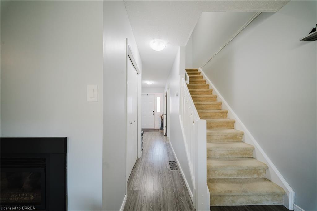 431-431 Springbank Avenue N, Woodstock, ON - Indoor Photo Showing Other Room With Fireplace