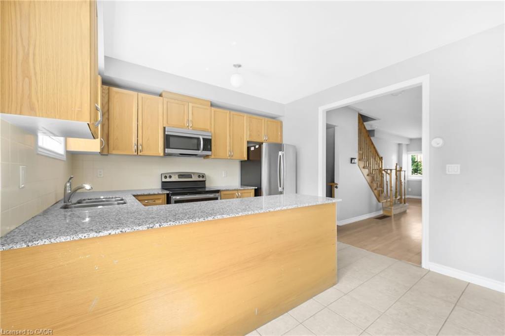21 Kayak Heights, Brampton, ON - Indoor Photo Showing Kitchen With Double Sink