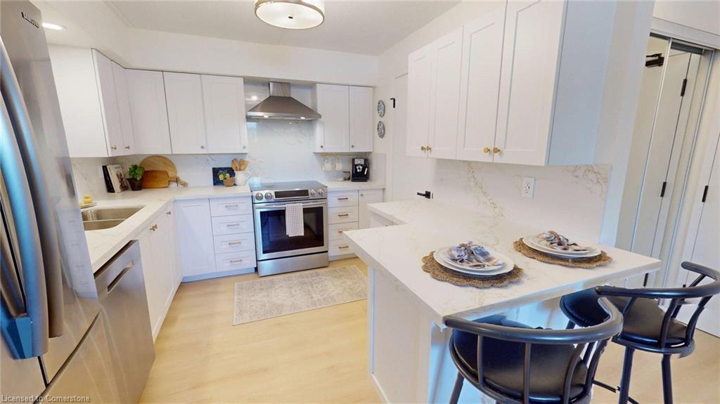 201-50 Campbell Court Court, Stratford, ON - Indoor Photo Showing Kitchen With Double Sink