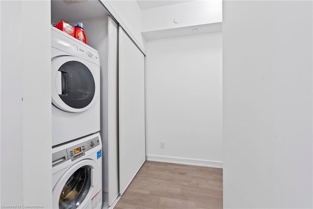 206-57 St Joseph Street, Toronto, ON - Indoor Photo Showing Laundry Room