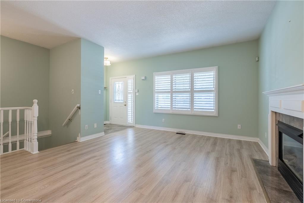 3-34 Southbrook Drive, Binbrook, ON - Indoor With Fireplace