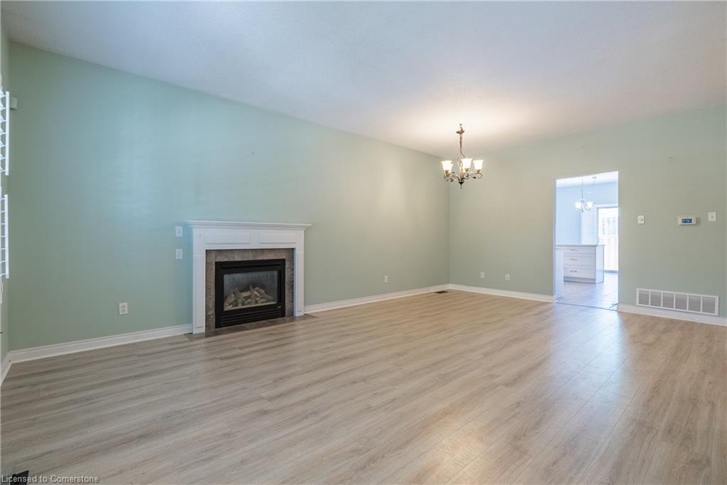 3-34 Southbrook Drive, Binbrook, ON - Indoor Photo Showing Living Room With Fireplace