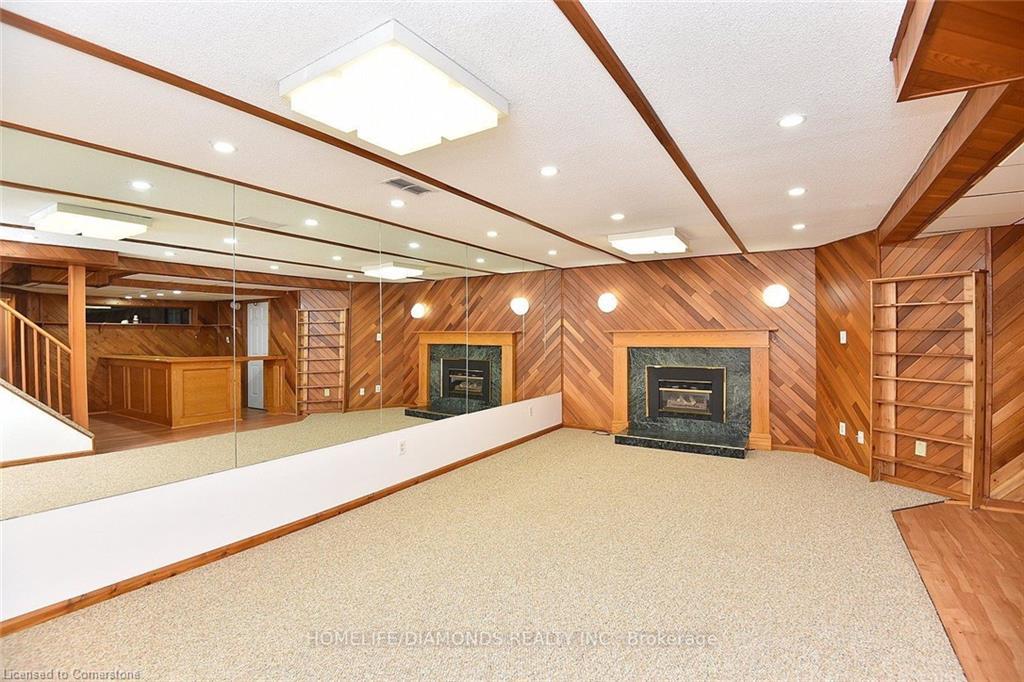 95 Birchpark Drive N, Grimsby, ON - Indoor Photo Showing Other Room With Fireplace