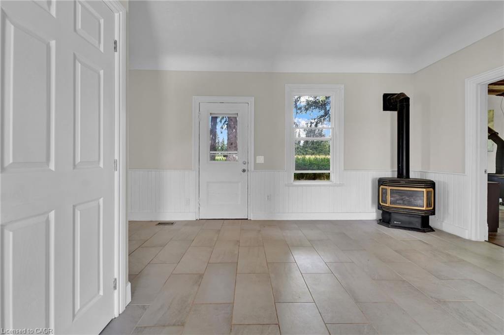 783 Highway 6 N, Hamilton, ON - Indoor Photo Showing Other Room With Fireplace