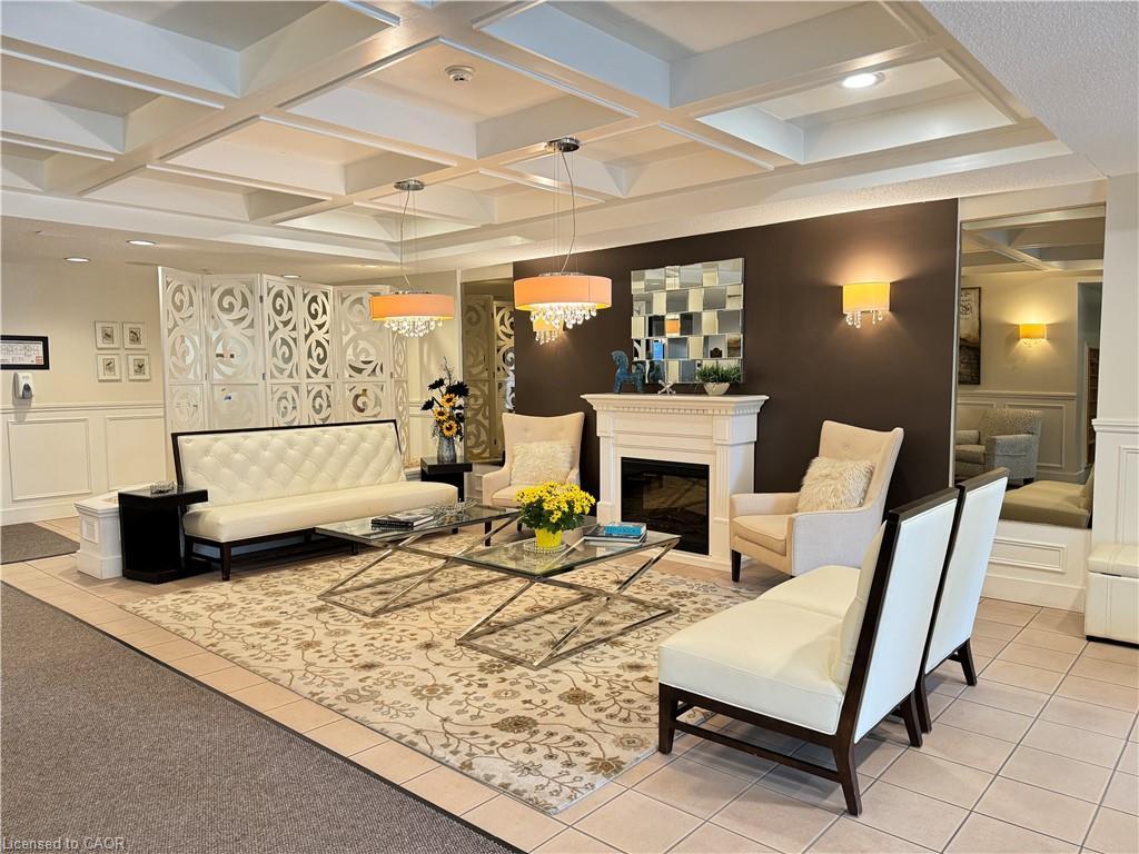 608-265 Westcourt Place, Waterloo, ON - Indoor With Fireplace