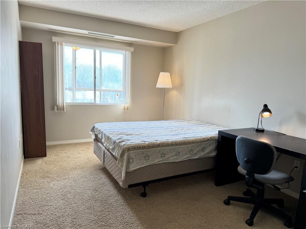 608-265 Westcourt Place, Waterloo, ON - Indoor Photo Showing Bedroom
