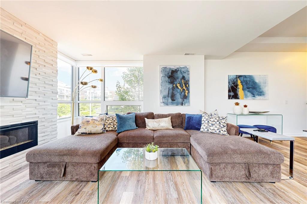 10-233 Broward Way, Innisfil, ON - Indoor Photo Showing Living Room With Fireplace