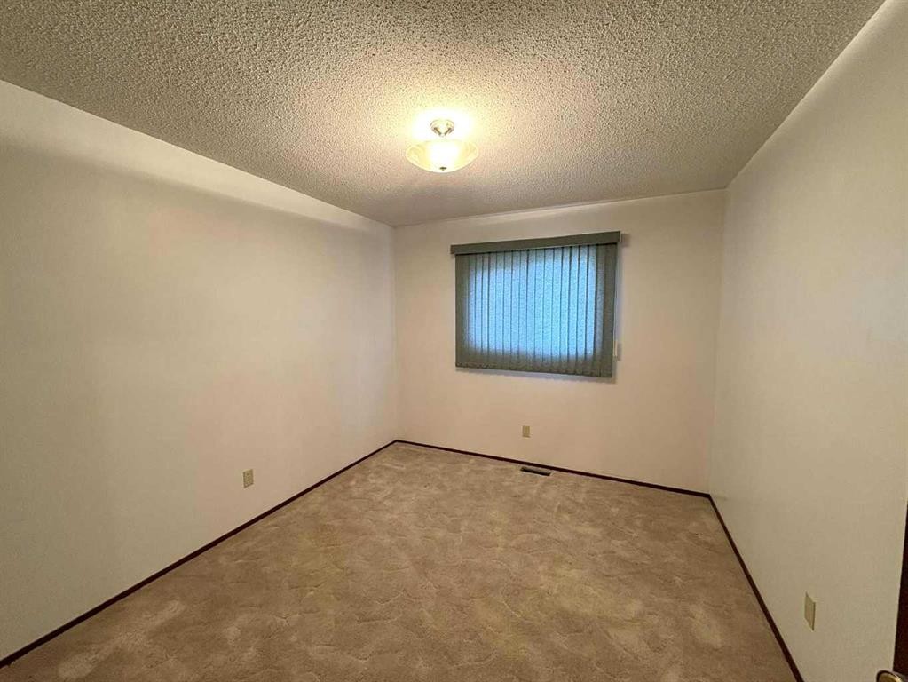 9106 94 Avenue, Lac La Biche, AB - Indoor Photo Showing Other Room