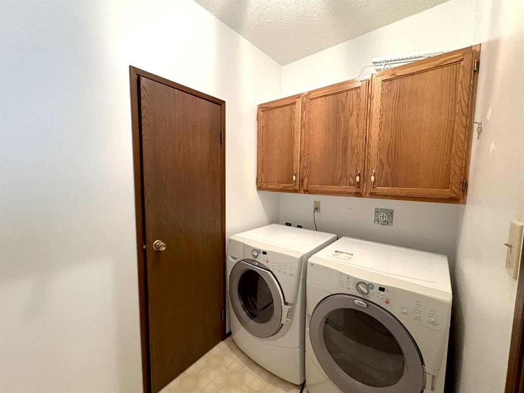 9106 94 Avenue, Lac La Biche, AB - Indoor Photo Showing Laundry Room