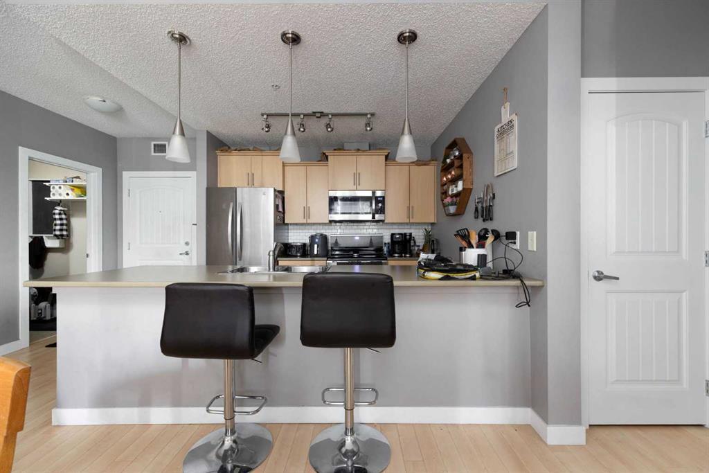 3607-135C Sandpiper Road, Fort Mcmurray, AB - Indoor Photo Showing Kitchen With Upgraded Kitchen