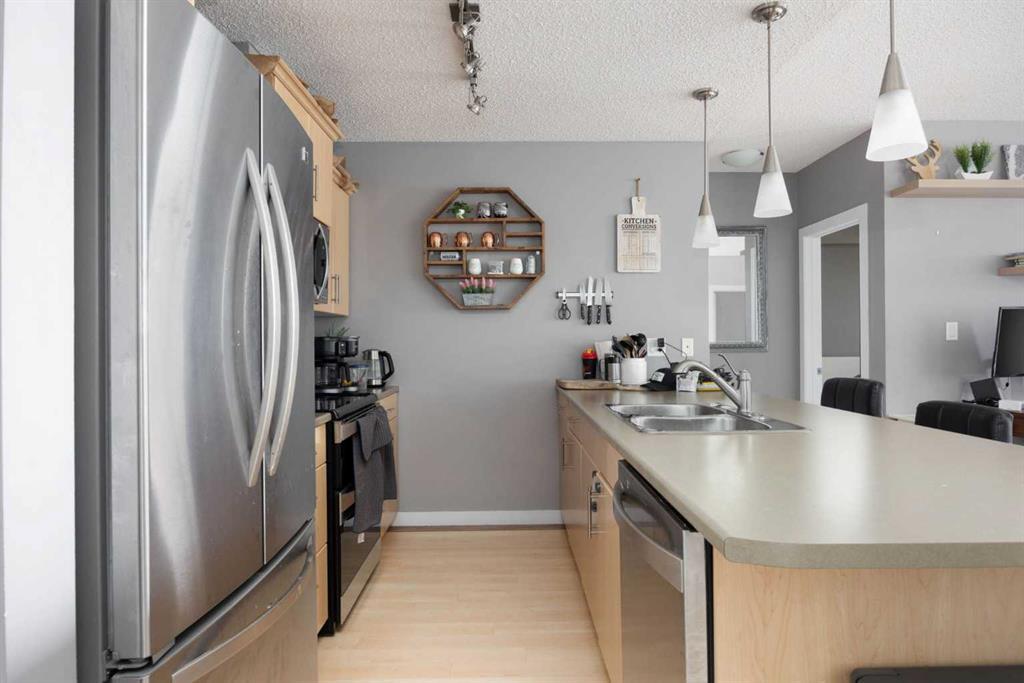 3607-135C Sandpiper Road, Fort Mcmurray, AB - Indoor Photo Showing Kitchen With Double Sink