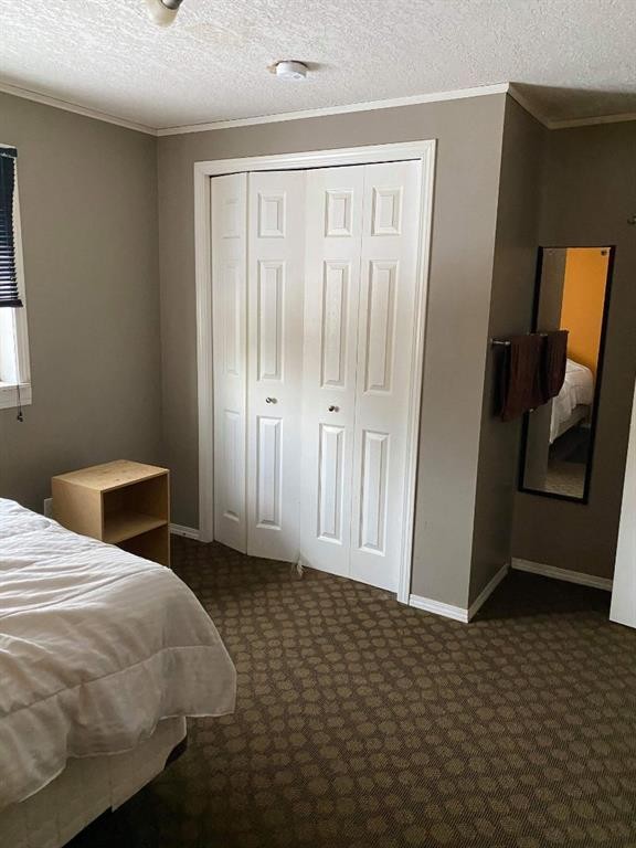 124 Singer Drive, Anzac, AB - Indoor Photo Showing Bedroom