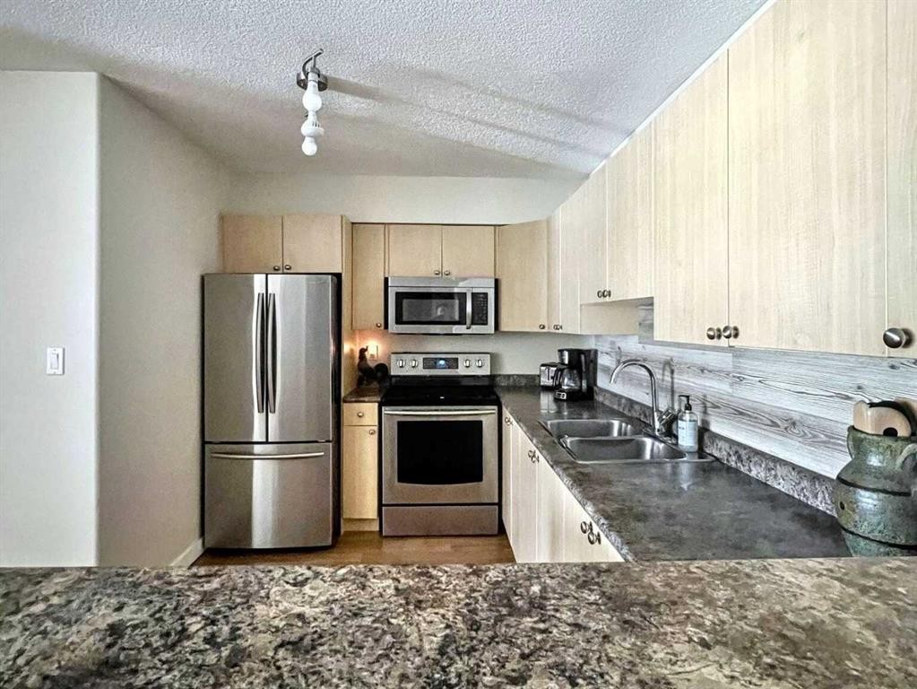 316-236 Stony Mountain Road, Anzac, AB - Indoor Photo Showing Kitchen With Stainless Steel Kitchen With Double Sink