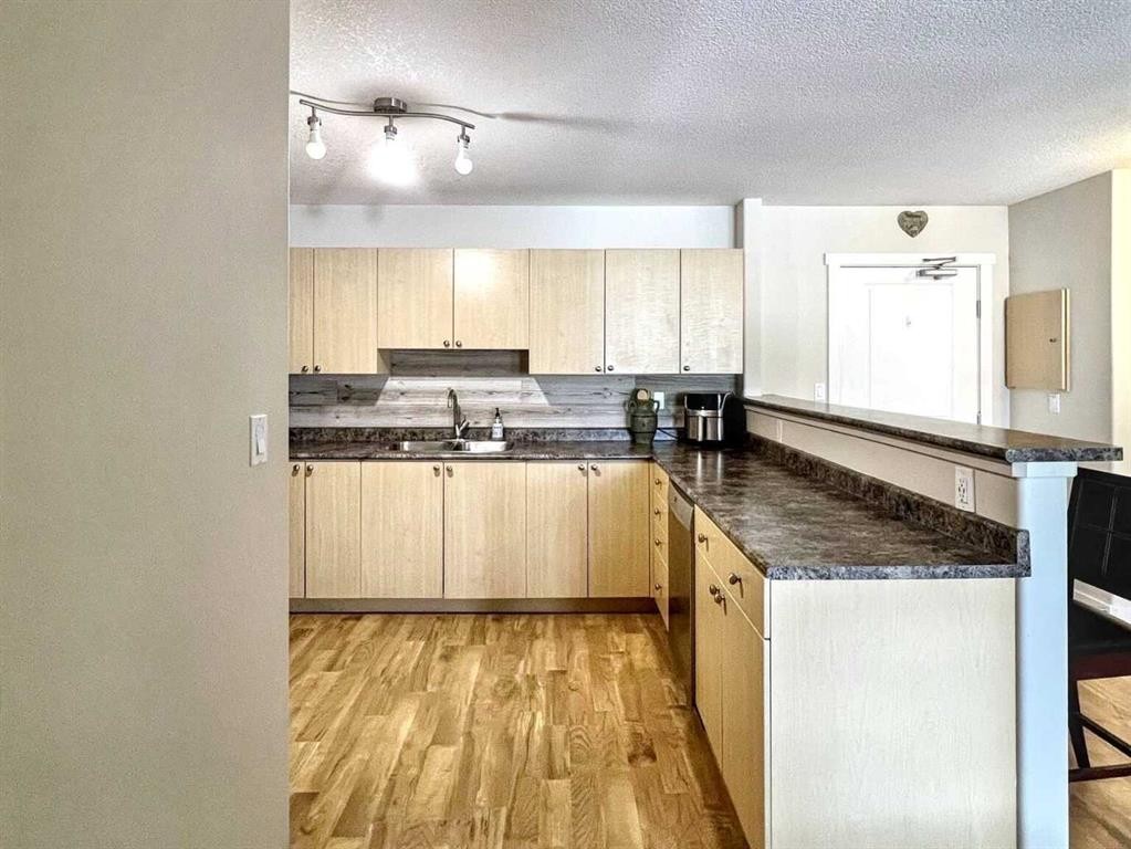 316-236 Stony Mountain Road, Anzac, AB - Indoor Photo Showing Kitchen With Double Sink
