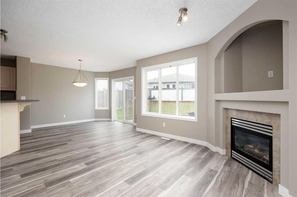 164 Cinnamon Street, Fort Mcmurray, AB - Indoor Photo Showing Living Room With Fireplace