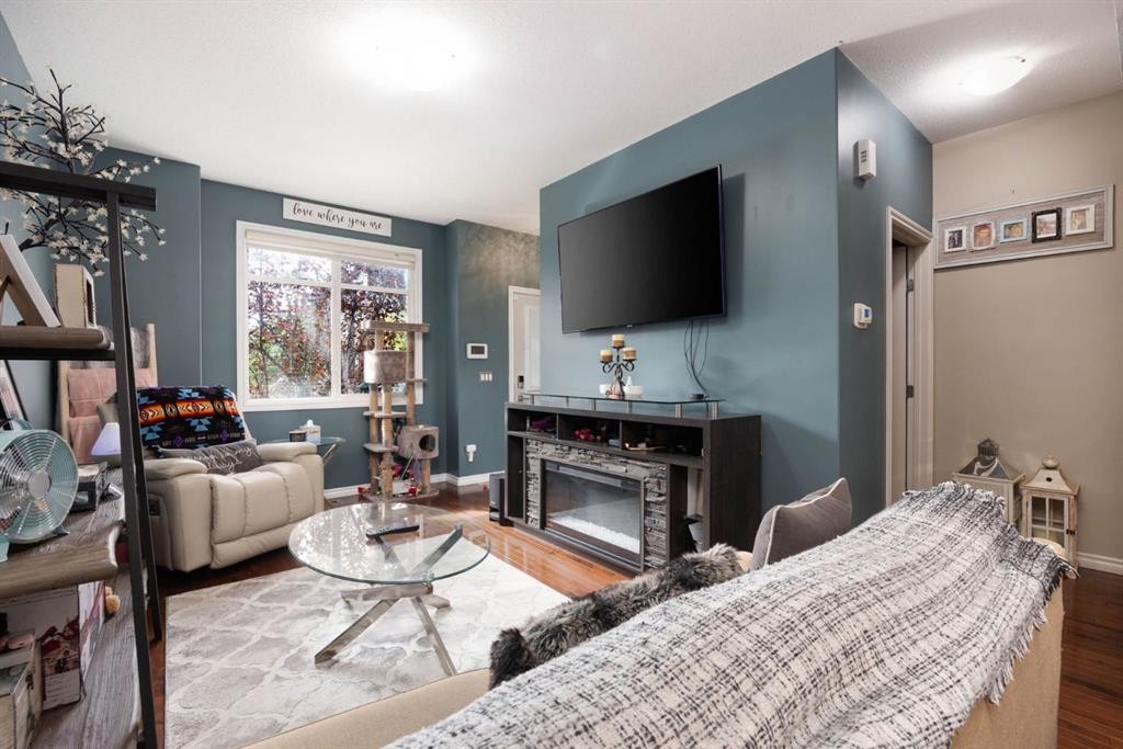 12-136 Fontaine Crescent, Fort Mcmurray, AB - Indoor Photo Showing Living Room With Fireplace