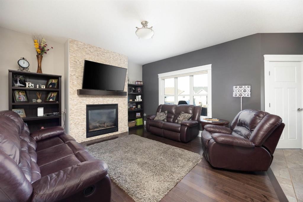 149 Ward Crescent, Fort Mcmurray, AB - Indoor Photo Showing Living Room With Fireplace