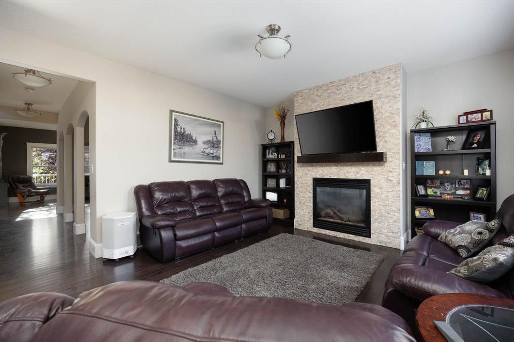 149 Ward Crescent, Fort Mcmurray, AB - Indoor Photo Showing Living Room With Fireplace