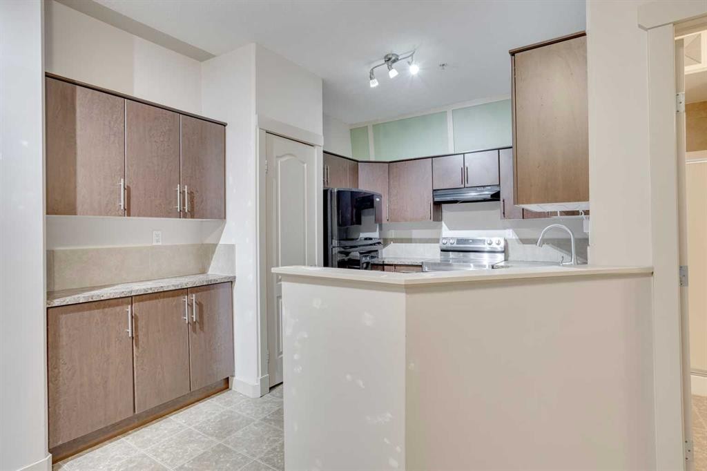 203-921A Thickwood Boulevard, Fort Mcmurray, AB - Indoor Photo Showing Kitchen