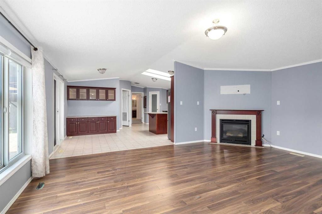 305 Ash Way, Fort Mcmurray, AB - Indoor Photo Showing Living Room With Fireplace