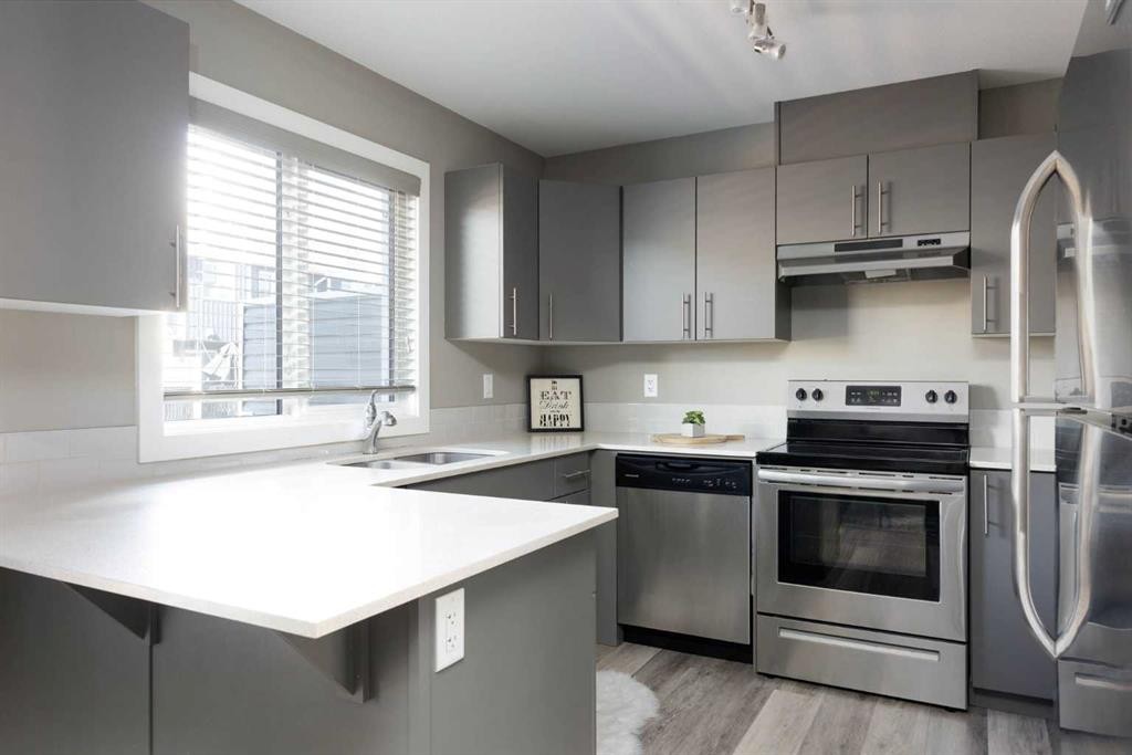 57-401 Athabasca Avenue, Fort Mcmurray, AB - Indoor Photo Showing Kitchen With Stainless Steel Kitchen
